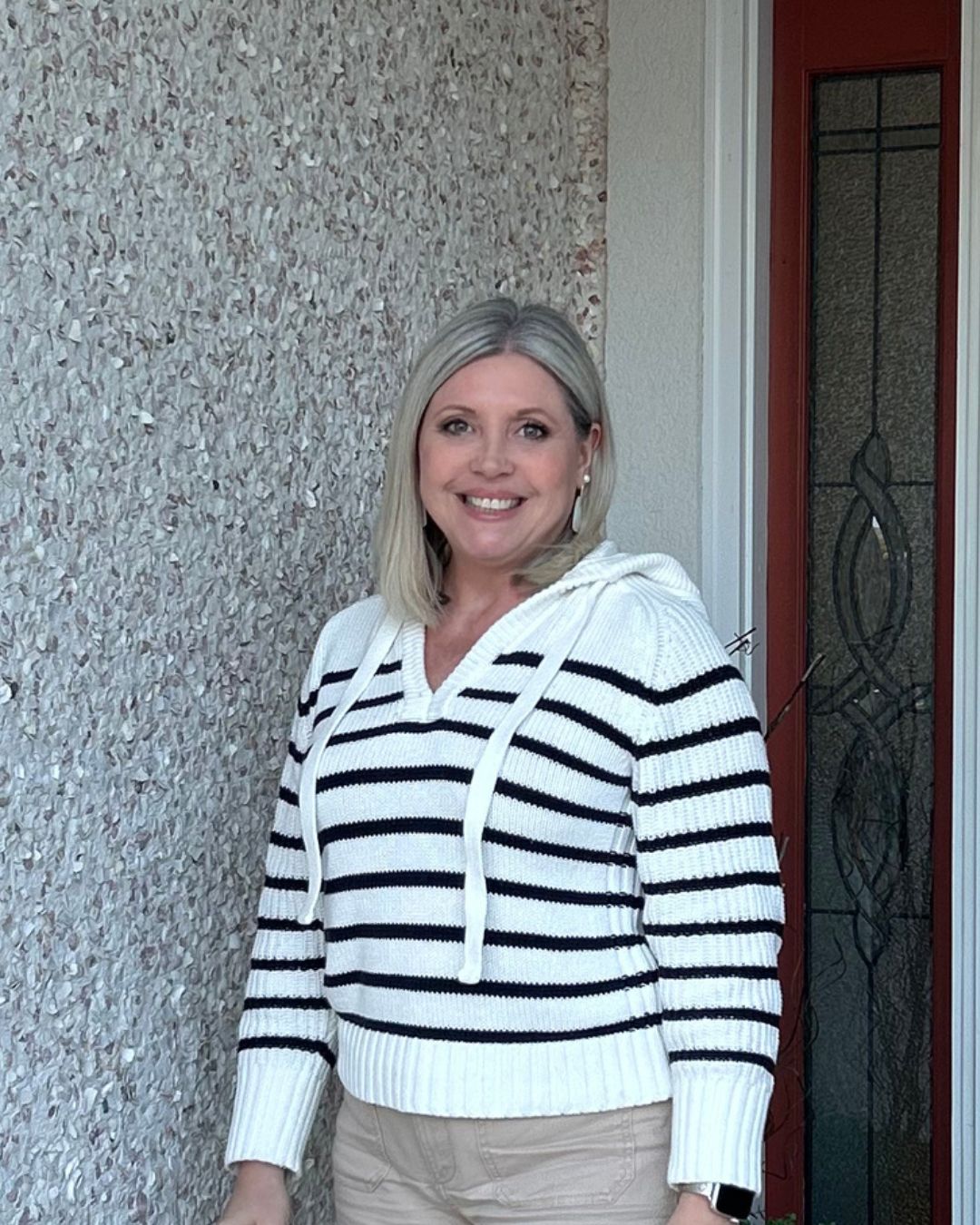 An Ivory Striped Hoodie Sweater: Relaxed Coastal Style in Neutral Tones